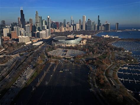 Chicago Bears reportedly mulling Soldier Field parking area as new stadium site as talks resume with schools over Arlington Heights location